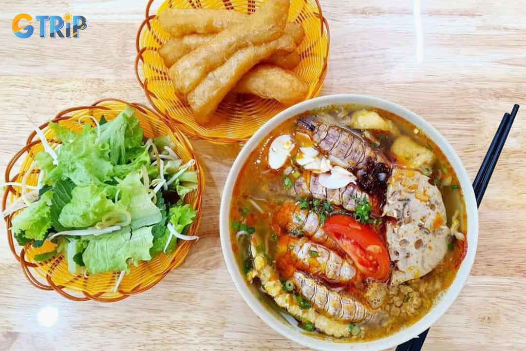 This eatery specializes in a unique variation that has captivated locals and travelers alike - the mantis shrimp bun rieu